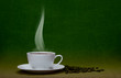 steaming coffee with beans and copy space