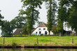 Photo: Dutch farmhouse near river Dutch farmhouse near river