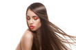 woman with long brown hairs and red lips