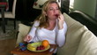 Woman eating fruit
