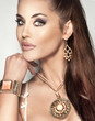 Portrait of attractive brunette beauty with beautiful jewellery.
