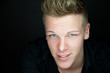 Portrait of a beautiful young blond man