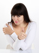 woman in home office showing his thumb, okay, sure,