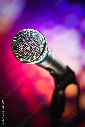 Photo: microphone against purple background microphone against purple background