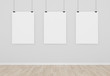 three blank posters