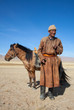 Photo: Nomad with his horse Nomad with his horse