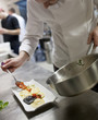 The main cook, it is masterful preparing delightful ravioli with