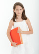 Foto: Girl holding books Girl holding books