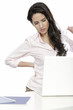 Photo: Woman with back pain at desk Woman with back pain at desk