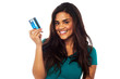 Attractive model displaying her credit card
