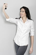 Woman taking a self portrait shot