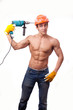 Muscular  worke with an electric drill on a white background.