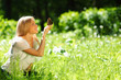 Woman playing with a butterfly