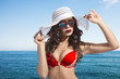 cute girl in sexy bikini on seaside