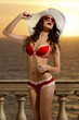 beauty girl sunbathing on sunset