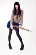 Photo: transvestite in heels with electric guitar transvestite in heels with electric guitar