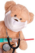 Teddy with syringe and stethoscope