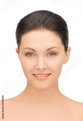 Photo: face of beautiful young brunette woman face of beautiful young brunette woman