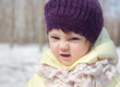 Fun baby in hat joy outdoor winter background