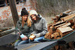 Photo: two girls preparing firewood two girls preparing firewood
