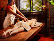 Woman having Ayurvedic spa treatment.