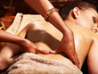 Woman having Ayurvedic spa treatment.