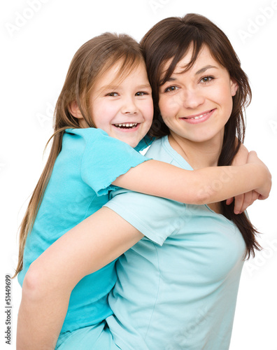 Photo: Portrait of a happy mother with her daughter Portrait of a happy mother with her daughter