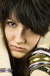 brunette lady with bracelets