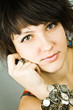 young brunette lady with bracelets
