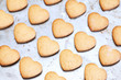 Home made shortbread heart shaped cookies on baking tray
