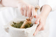 Cook preparing pesto