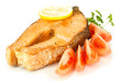 Photo: Appetizing grilled salmon with lemon and vegetables isolated Appetizing grilled salmon with lemon and vegetables isolated