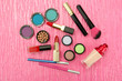 Decorative cosmetics on pink background