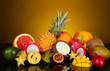 Composition of exotic fruits on colorful background