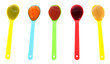 Baby puree in spoons isolated on white