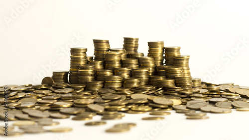 Photo: Pila de monedas, finanzas, dinero, capitalismo, la bolsa. Pila de monedas, finanzas, dinero, capitalismo, la bolsa.