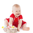 Baby girl and her birthday cake.