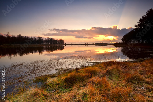 Photo: dramatic sunset over lake dramatic sunset over lake
