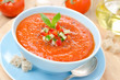 cold tomato soup gazpacho with basil and croutons in a bowl