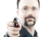 Photo: a man with a gun shooting in our direction a man with a gun shooting in our direction
