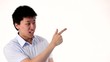 Video: Funny Asian man pointing on a white copy space Funny Asian man pointing on a white copy space