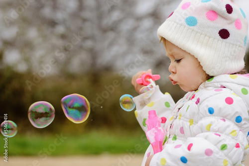 Photo: girl with soap bubbles girl with soap bubbles