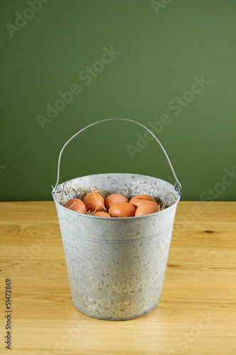 Photo: Metal bucket of eggs Metal bucket of eggs