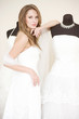 Photo: Young woman in bridal dress Young woman in bridal dress