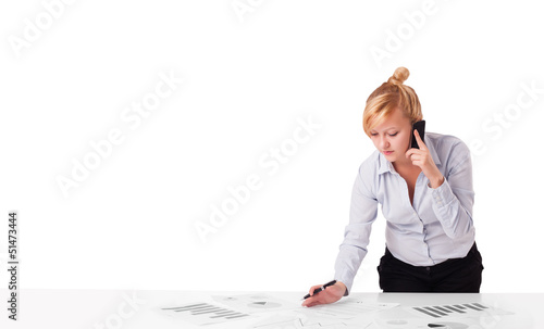 Photo: Young businesswoman with plain white copy space Young businesswoman with plain white copy space