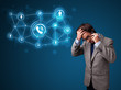 Young boy making phone call with social network icons