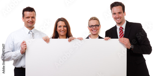 Photo: gruppe mit hinweisschild gruppe mit hinweisschild