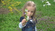 Child Smelling, Playing with Spring Flowers in Park, Children