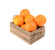 Ripe tasty tangerines with leaves in wooden box