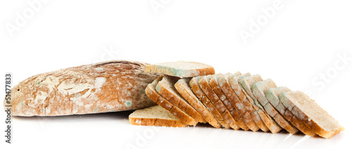 Photo: Mold on bread. Mouldy bread, isolated on a white background Mold on bread. Mouldy bread, isolated on a white background